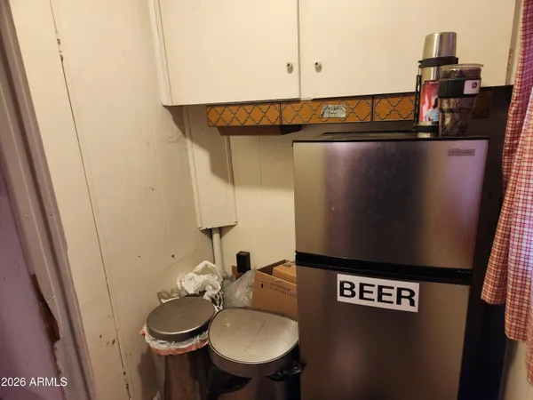 a bed room with two beds and a couch