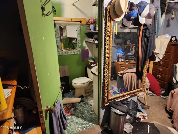 a room with furniture and musical instruments