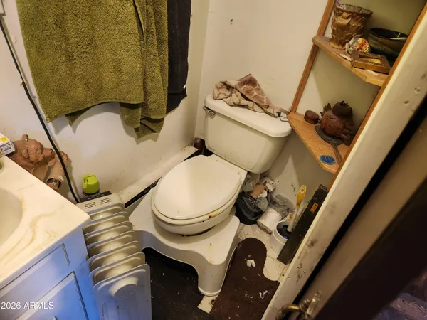 a backyard of a house with a tree