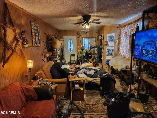 a view of a hallway with a wooden door