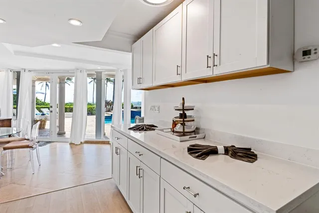a kitchen with sink cabinets and appliances