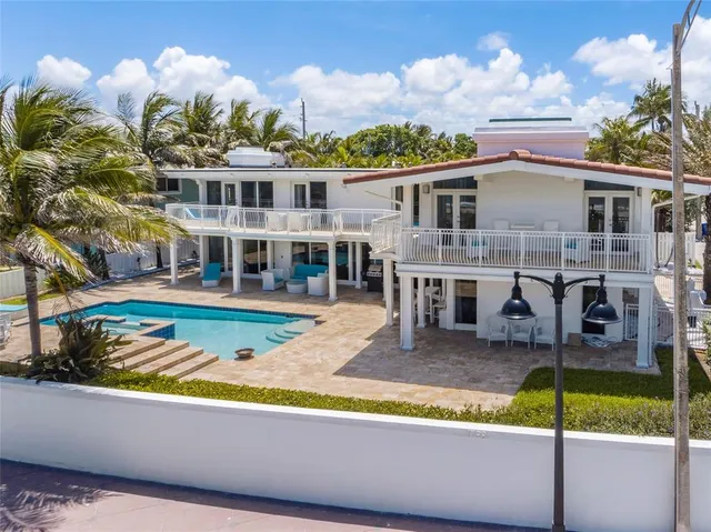 a view of a house with a swimming pool