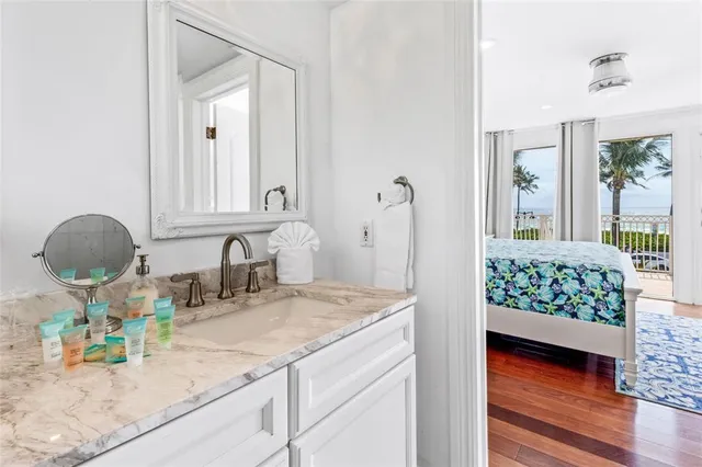 a kitchen with granite countertop a granite counter tops and a wooden floor