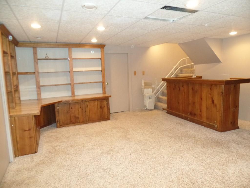 425 Kurt Drive Pittsburgh, PA 15243 - Photo 12 of 43 a view of an empty room with a wooden cabinet
