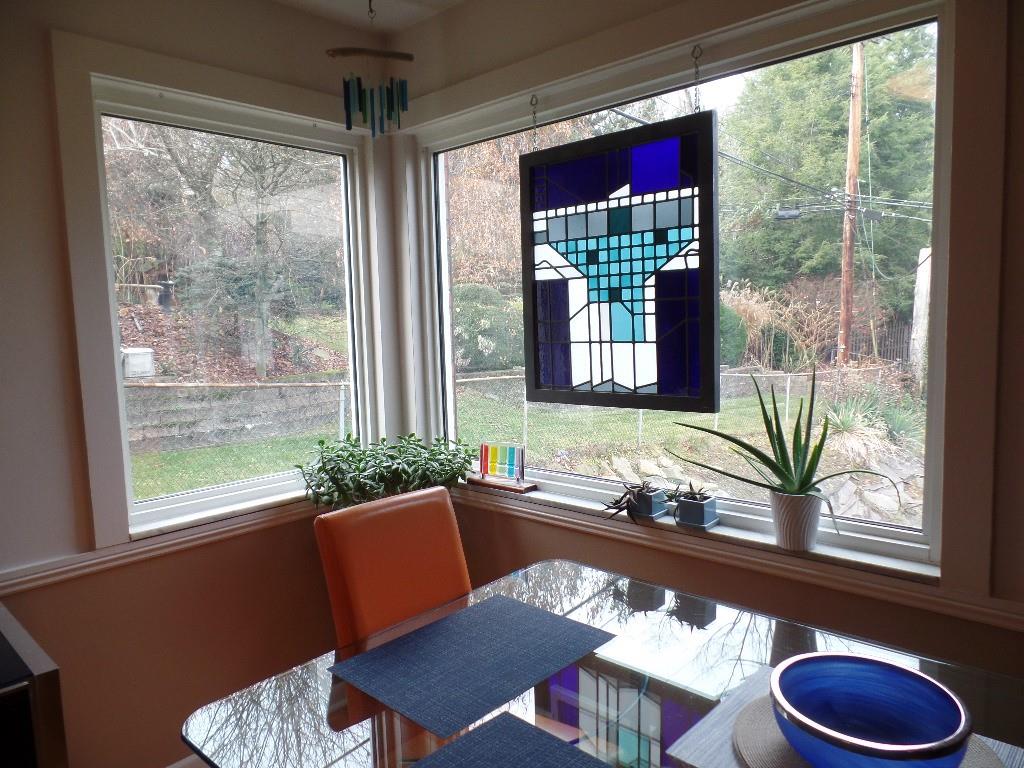 425 Kurt Drive Pittsburgh, PA 15243 - Photo 25 of 43 a view of a dining room with furniture wooden floor and a large window