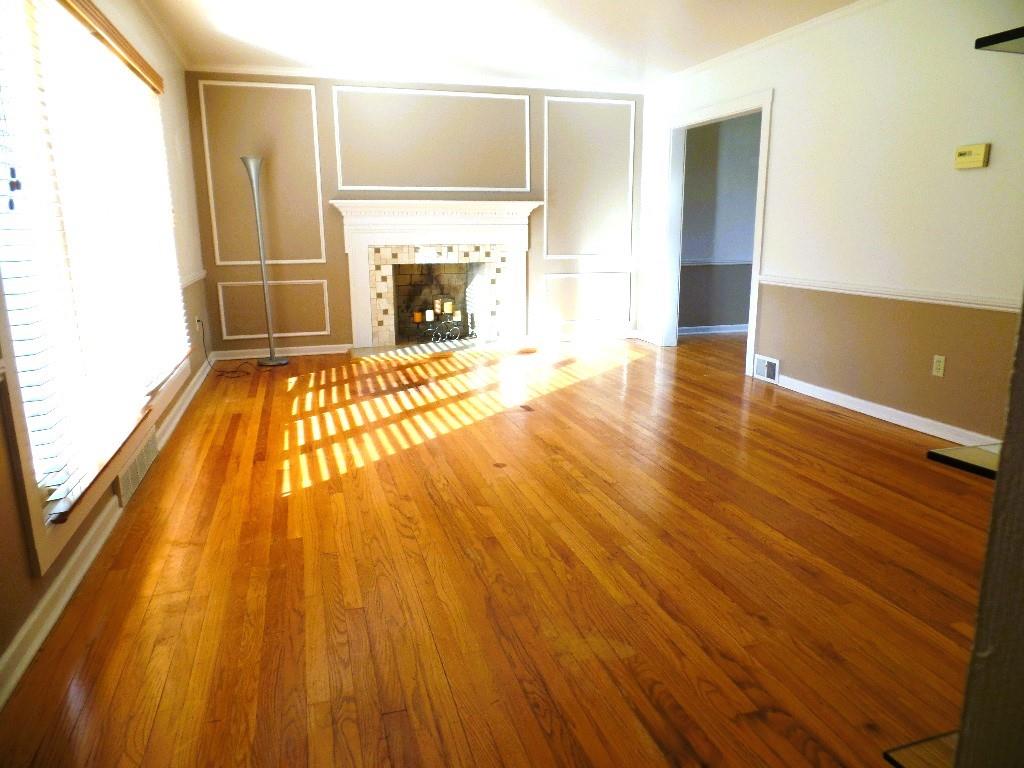 425 Kurt Drive Pittsburgh, PA 15243 - Photo 41 of 43 a view of empty room with wooden floor and fireplace
