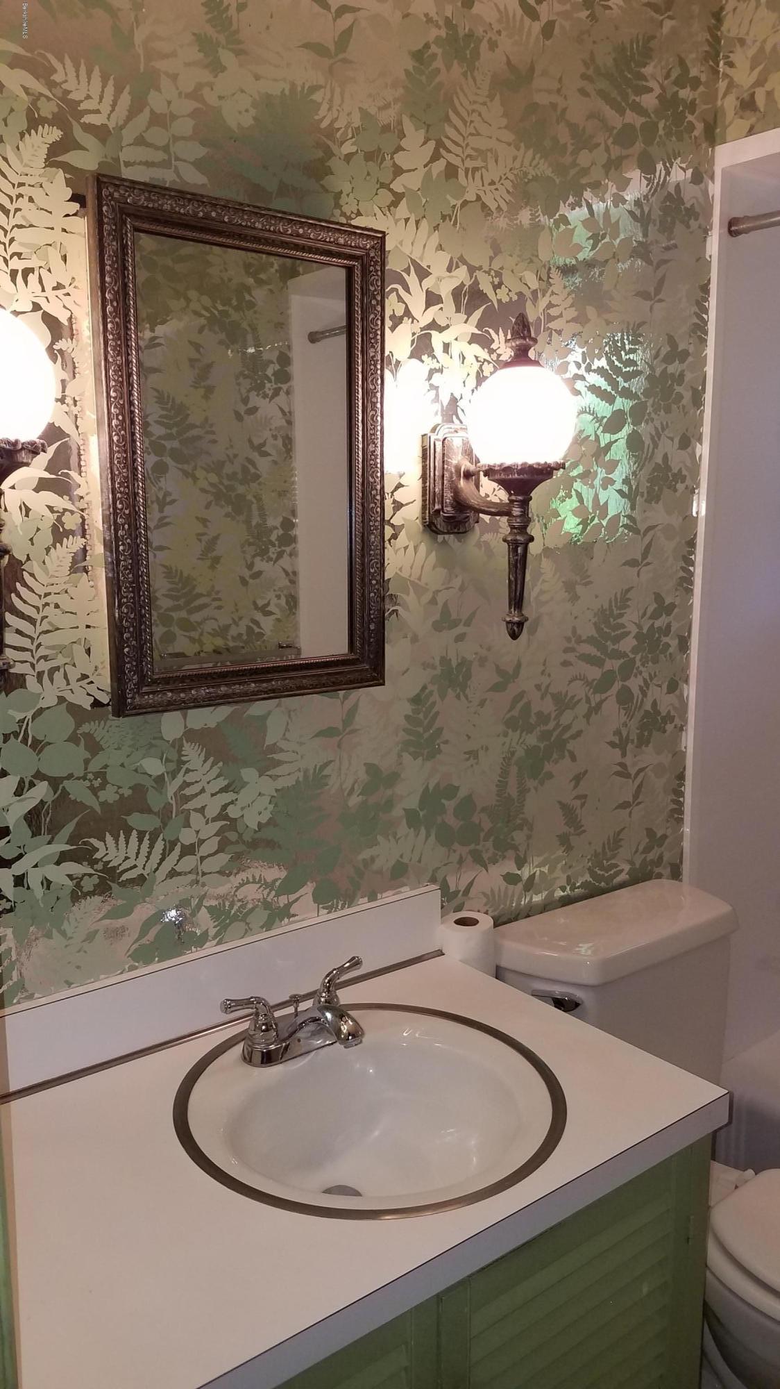 429 Hancock Road Williamstown, MA 01267 - Photo 14 of 33 a bathroom with a sink and a mirror