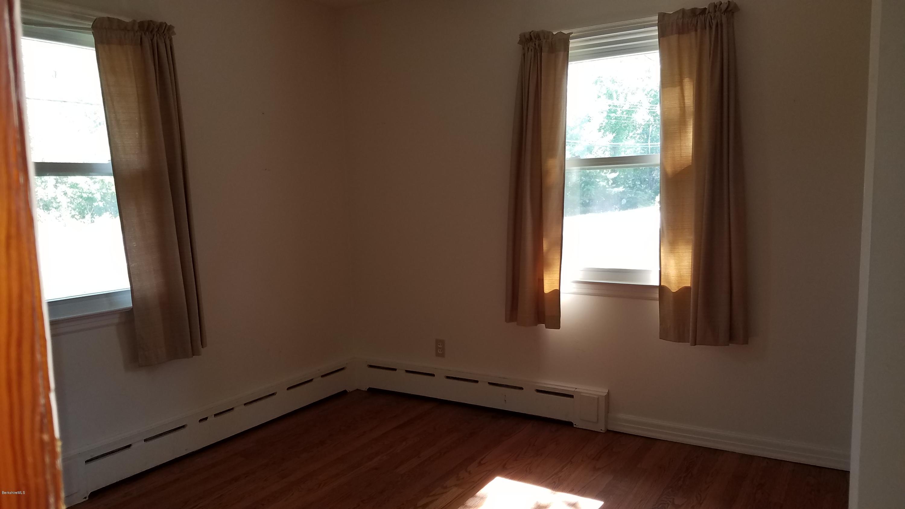 429 Hancock Road Williamstown, MA 01267 - Photo 16 of 33 a view of an empty room and window