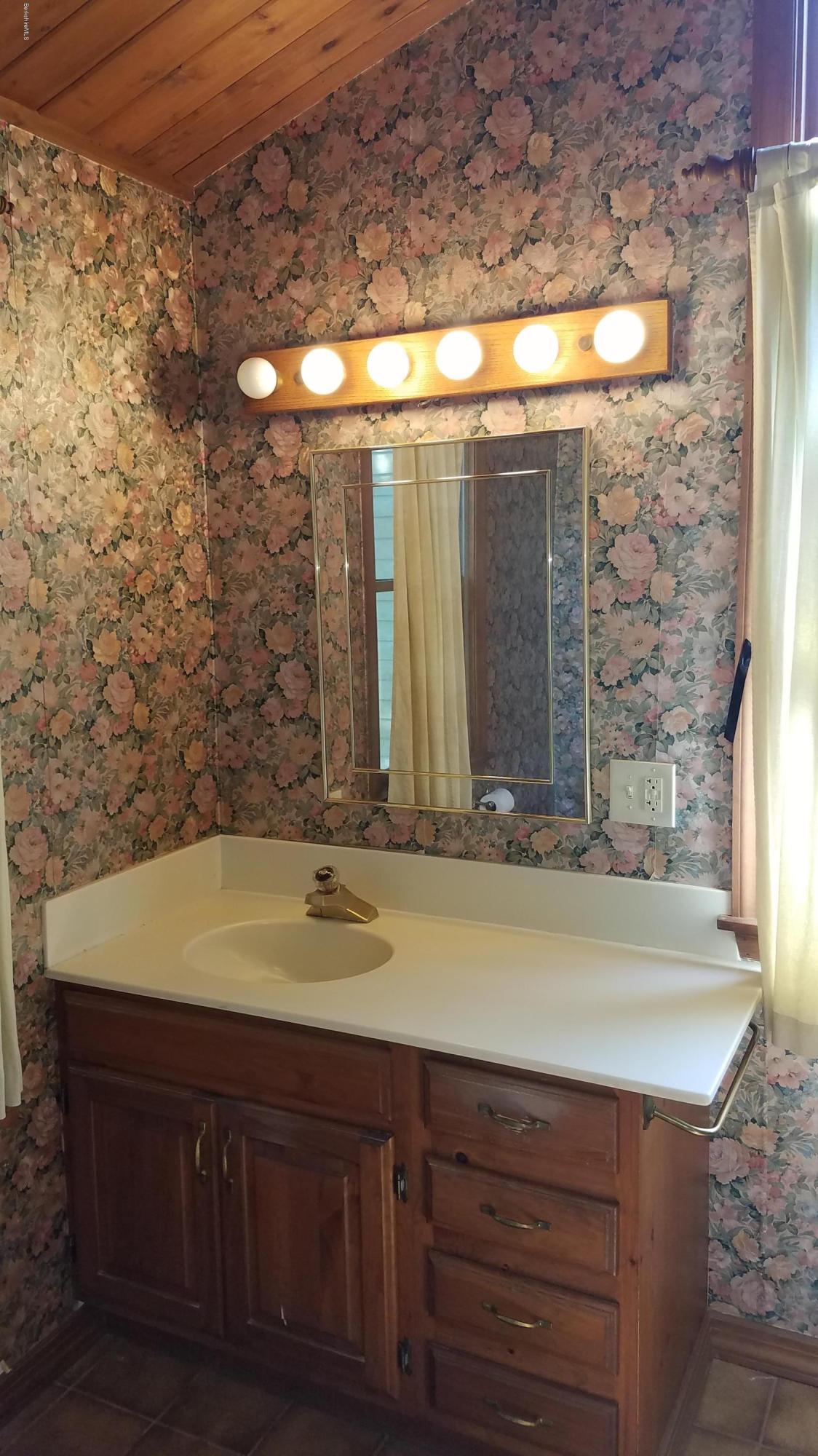 429 Hancock Road Williamstown, MA 01267 - Photo 20 of 33 a bathroom with a sink and a mirror