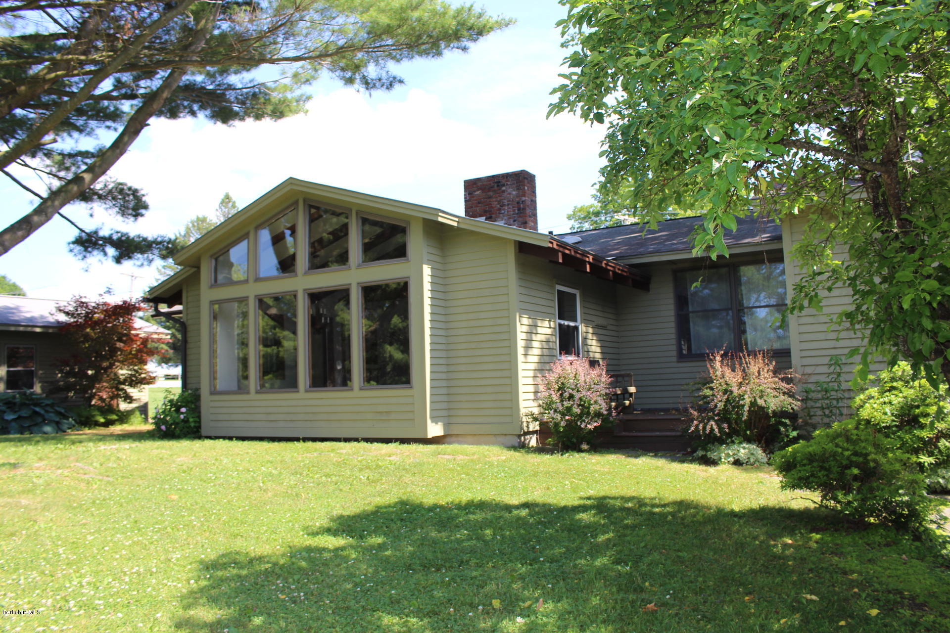 429 Hancock Road Williamstown, MA 01267 - Photo 26 of 33 a front view of a house with a garden
