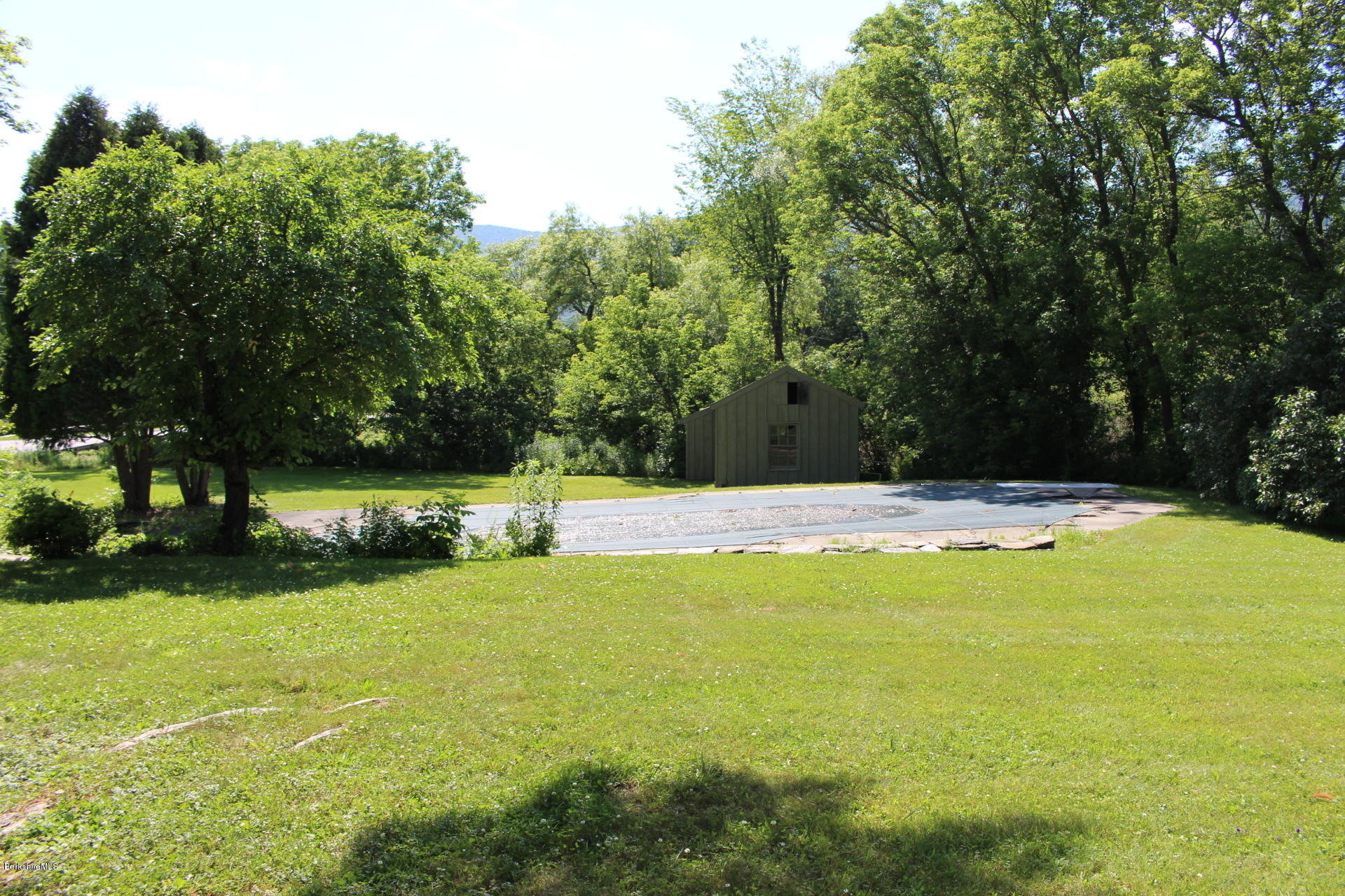 429 Hancock Road Williamstown, MA 01267 - Photo 30 of 33 a swimming pool with outdoor seating and yard
