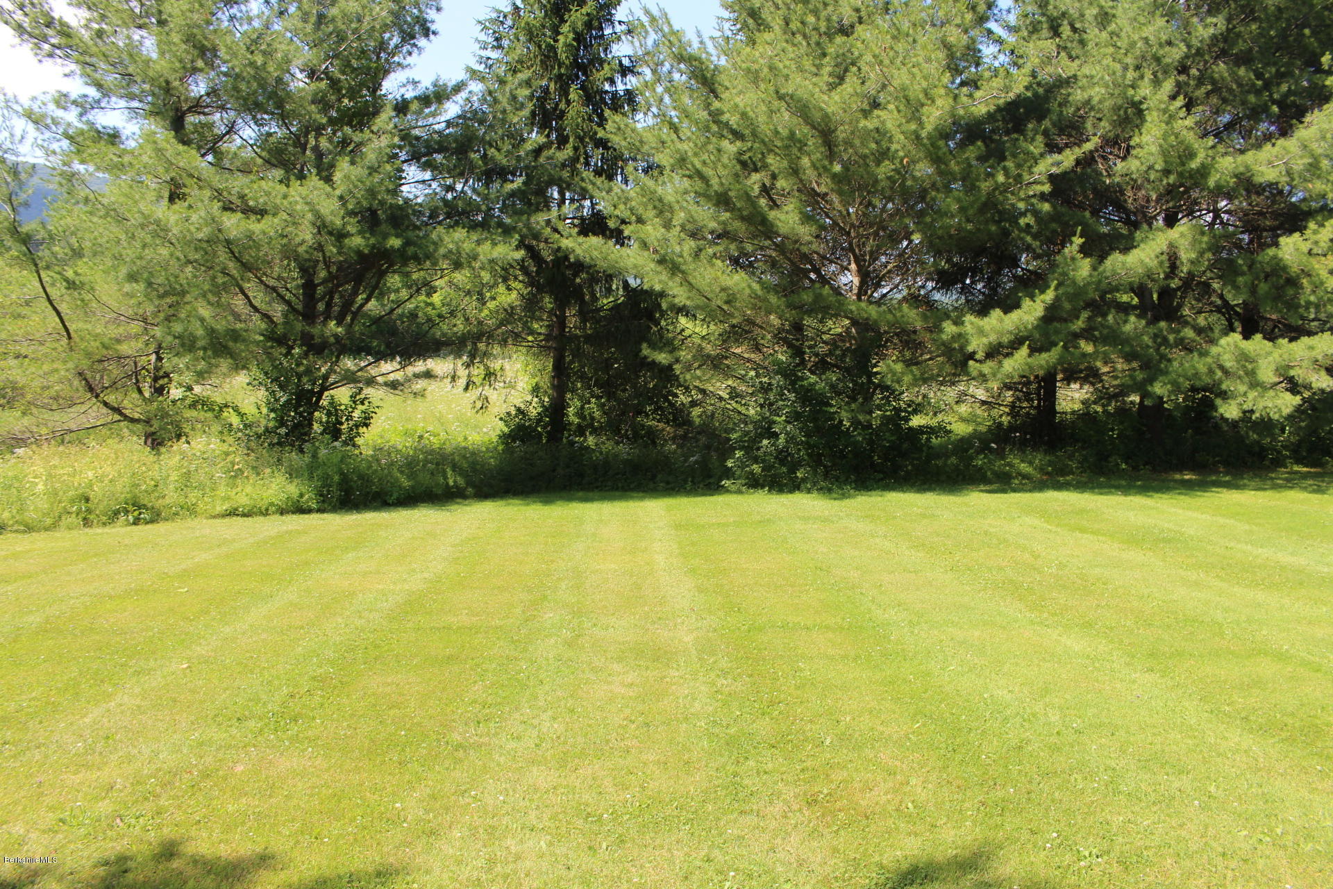 429 Hancock Road Williamstown, MA 01267 - Photo 32 of 33 a view of yard with swimming pool and green space