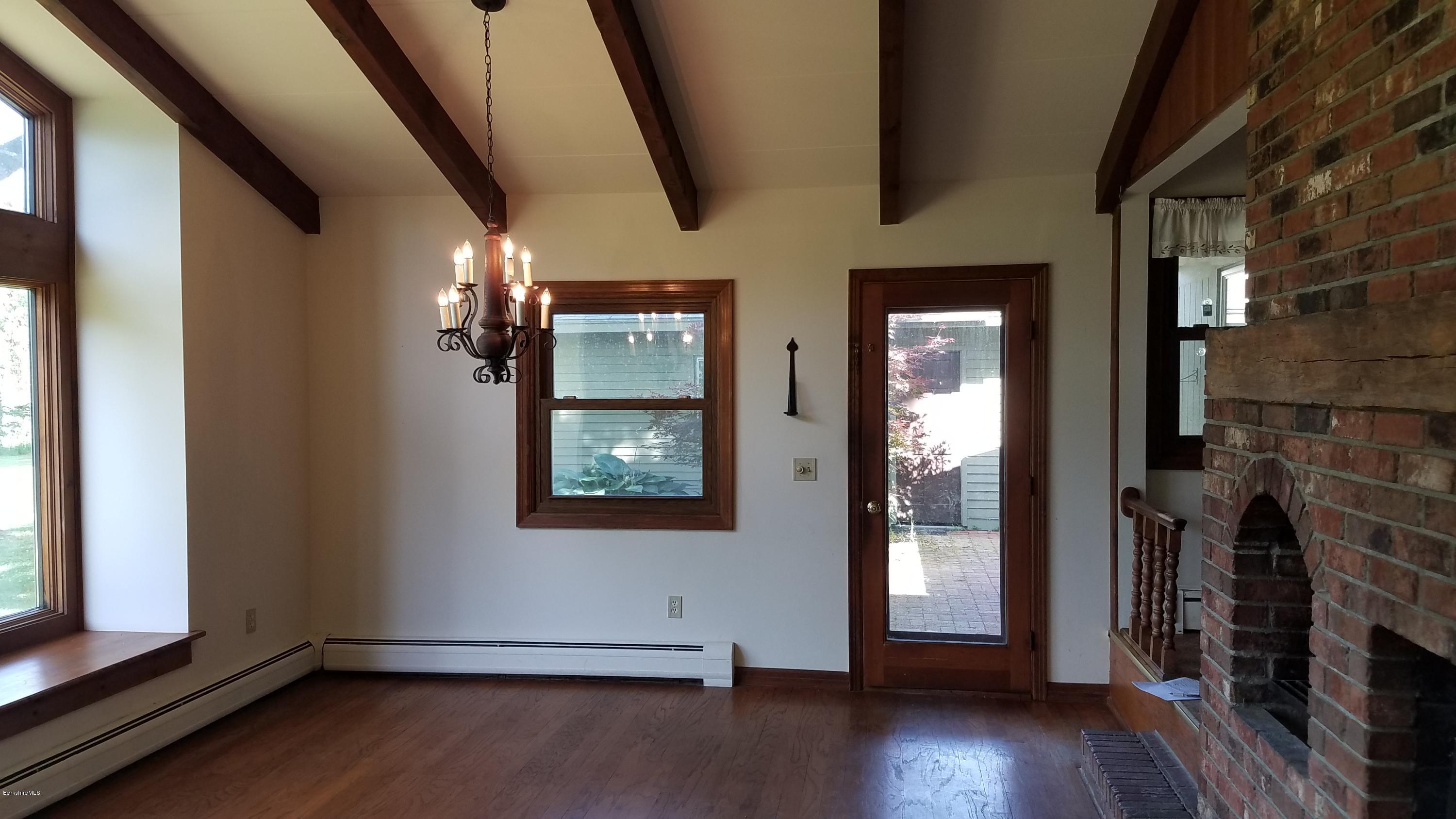429 Hancock Road Williamstown, MA 01267 - Photo 9 of 33 wooden floor in an empty room with a window