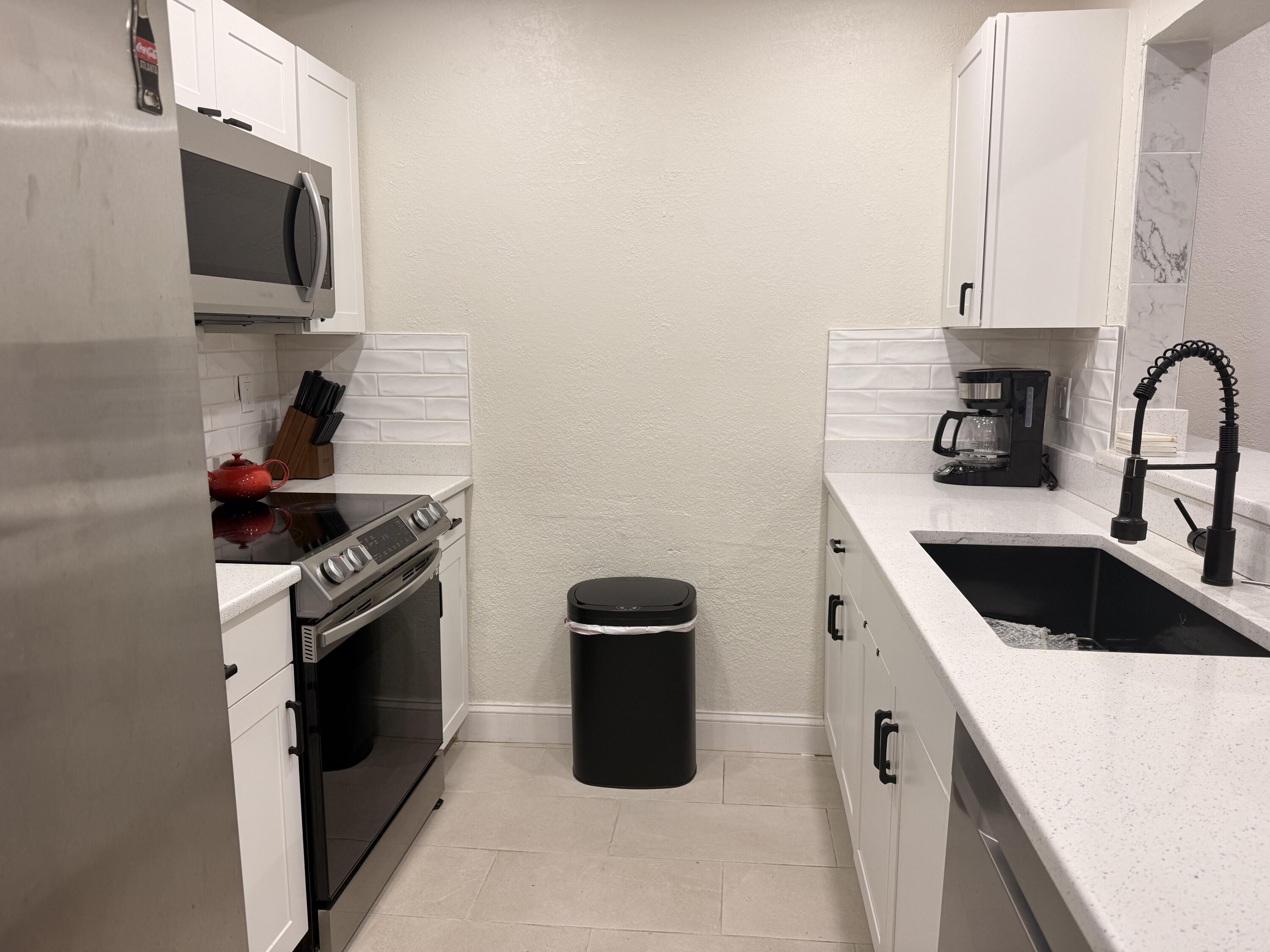 5130 Elmhurst Road, Unit A West Palm Beach, FL 33417 - Photo 5 of 25 IMG_7212