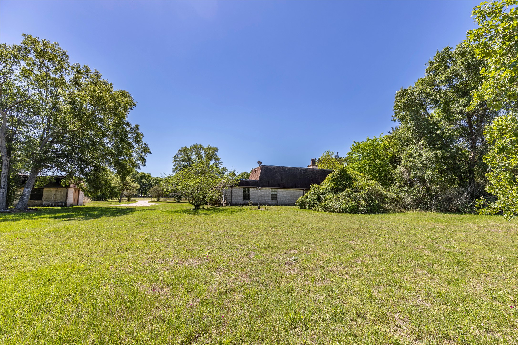119 Heritage Trail Bellville, TX 77418 - Photo 12 of 20 a view of a swimming pool and an outdoor space