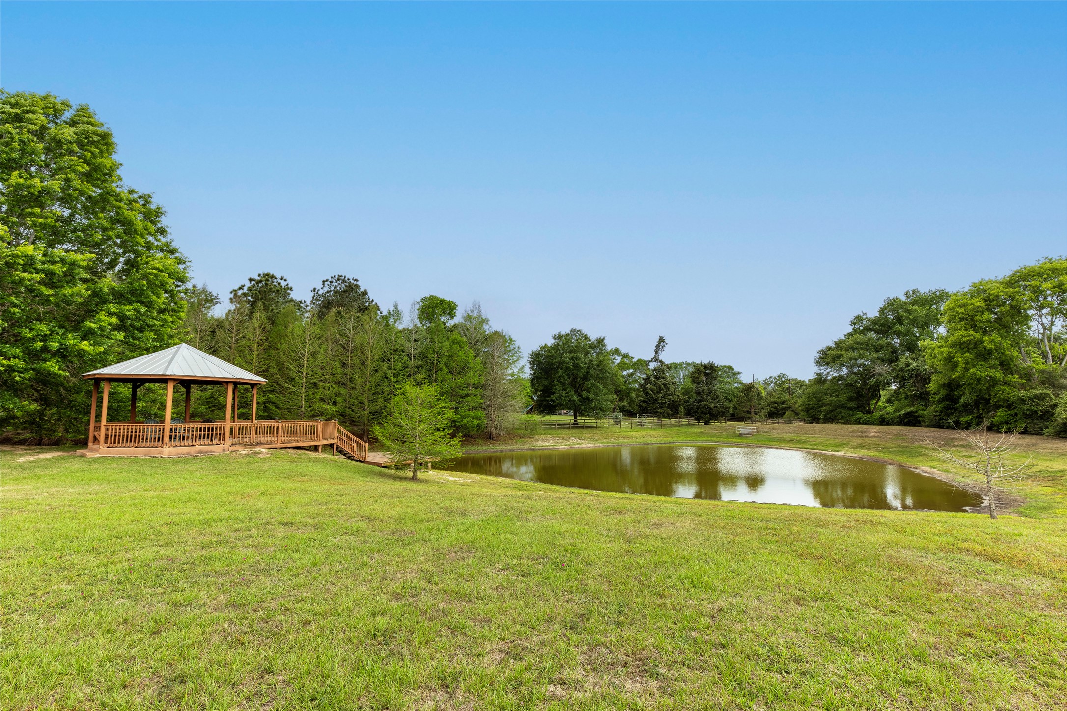 119 Heritage Trail Bellville, TX 77418 - Photo 20 of 20 a view of a house with a yard and swimming pool
