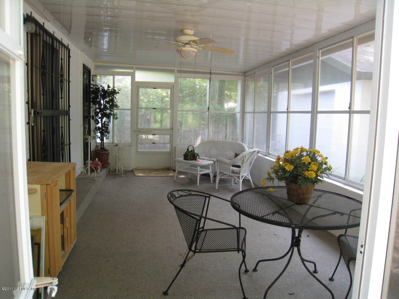 7418 Centauri Road Jacksonville, FL 32210 - Photo 1 of 22 a dining room with furniture and window