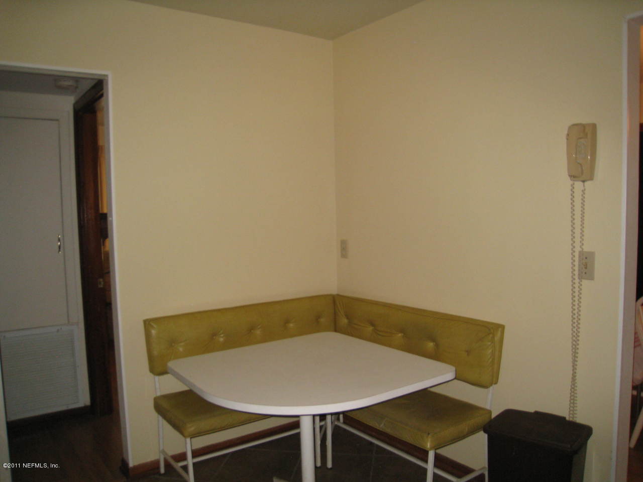 7418 Centauri Road Jacksonville, FL 32210 - Photo 11 of 22 a view of a room with table and chair
