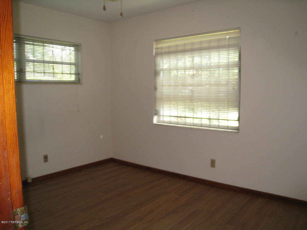 7418 Centauri Road Jacksonville, FL 32210 - Photo 14 of 22 an empty room with a window