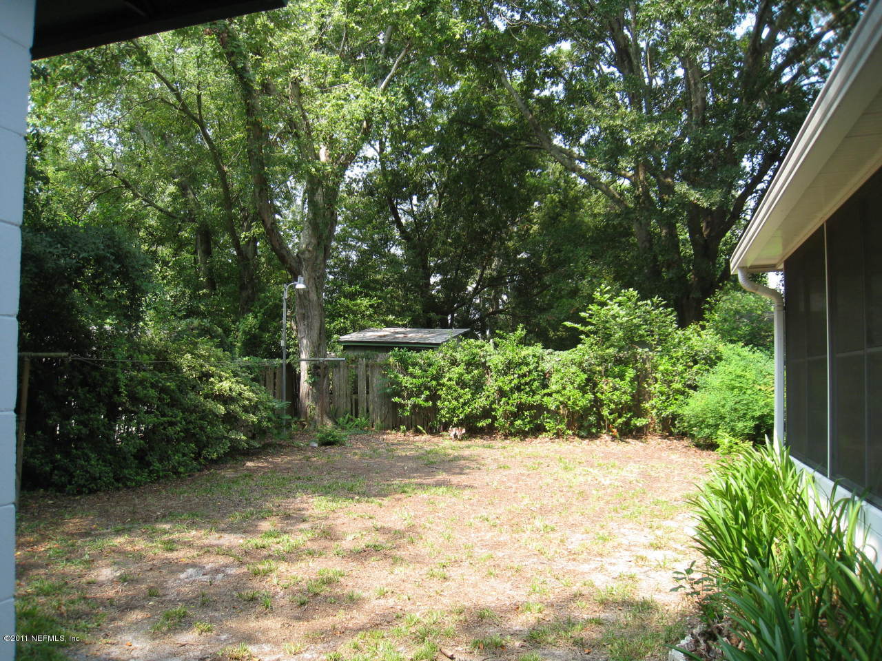 7418 Centauri Road Jacksonville, FL 32210 - Photo 20 of 22 a view of backyard with green space