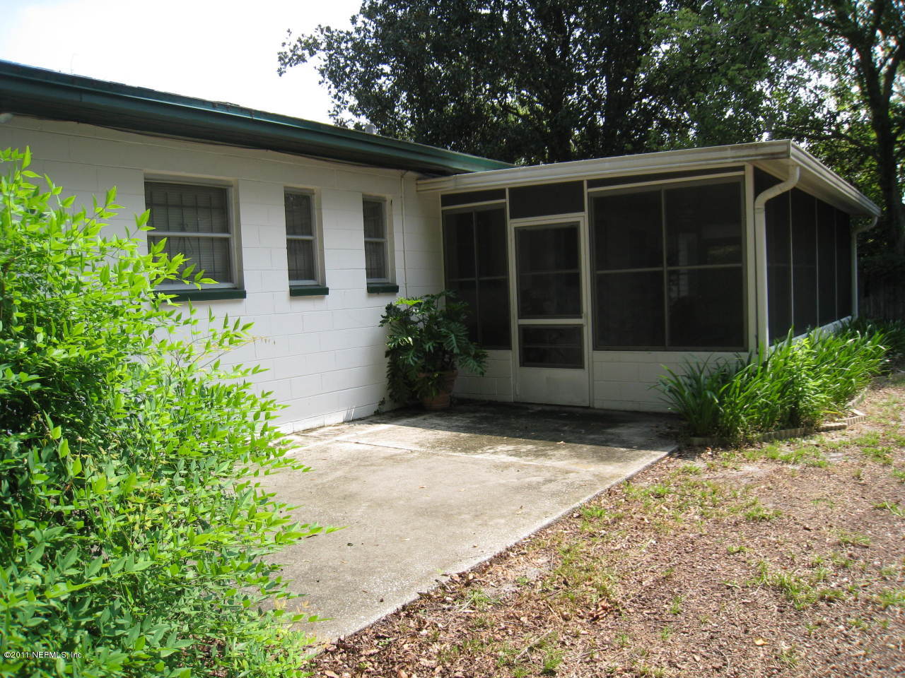 7418 Centauri Road Jacksonville, FL 32210 - Photo 22 of 22 a front view of a house with garden