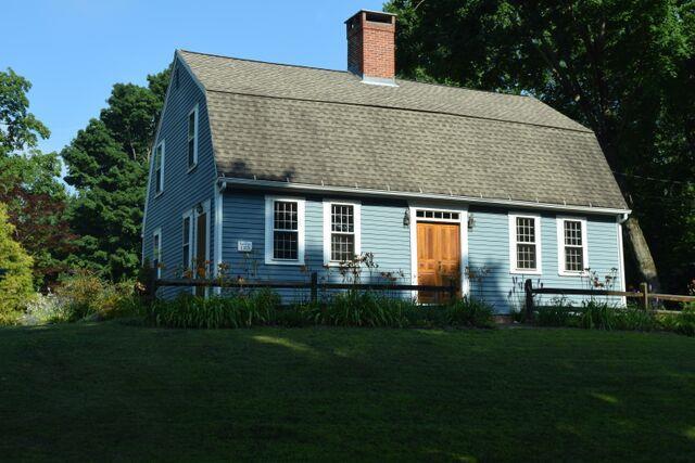 707 Nevers Road South Windsor, CT 06074 - Photo 1 of 1 a front view of a house with a garden