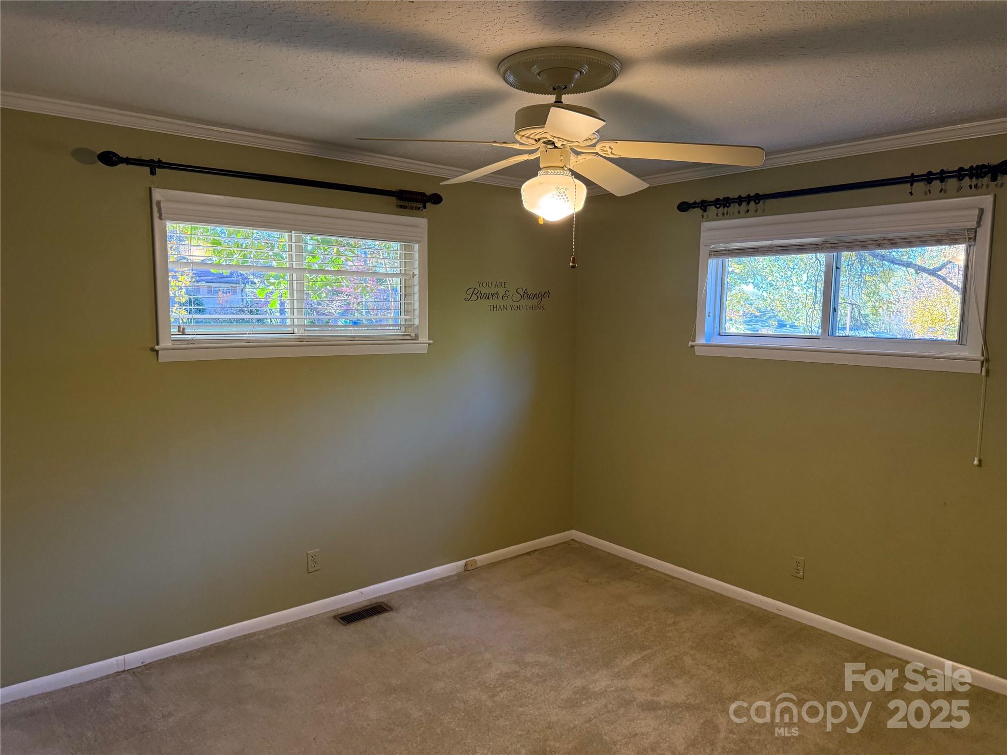 110 Forest Drive Locust, NC 28097 - Photo 16 of 29 a view of room with window and ceiling fan