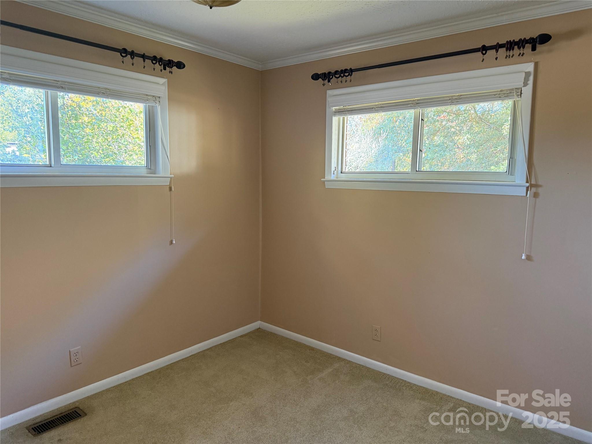 110 Forest Drive Locust, NC 28097 - Photo 17 of 29 an empty room with a window