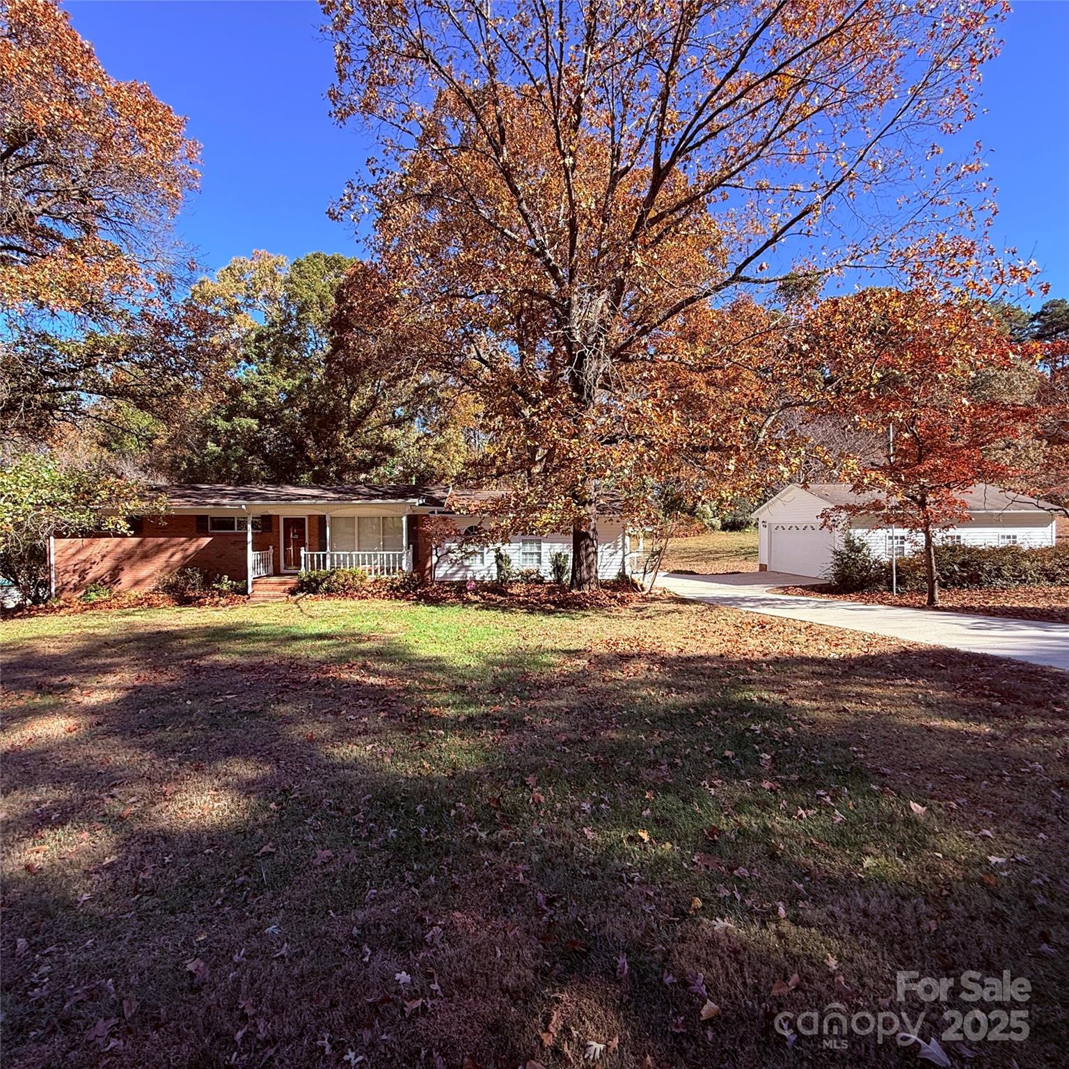 110 Forest Drive Locust, NC 28097 - Photo 2 of 29 a front view of a house with a yard