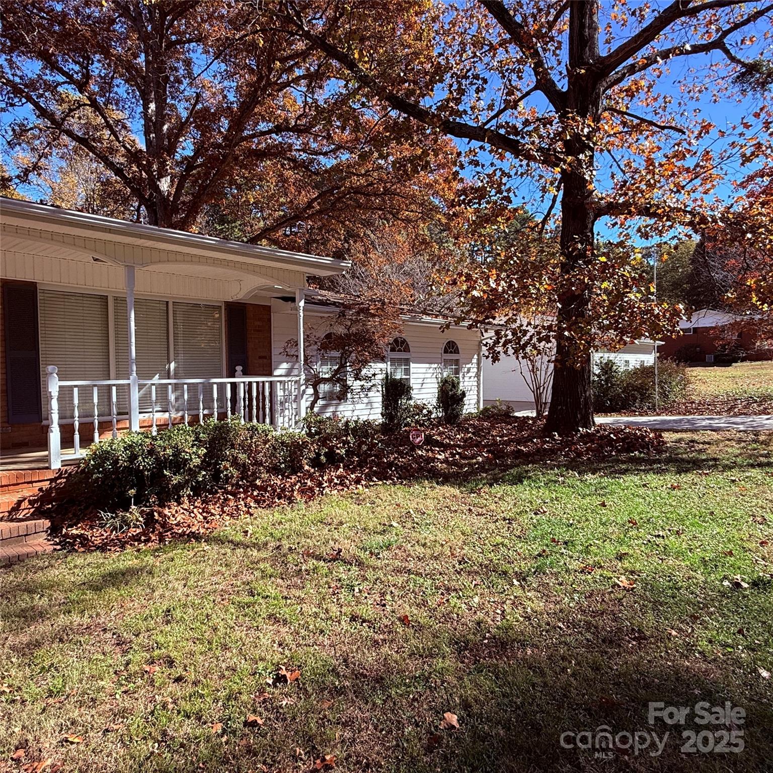 110 Forest Drive Locust, NC 28097 - Photo 5 of 29 a front view of a house with a yard