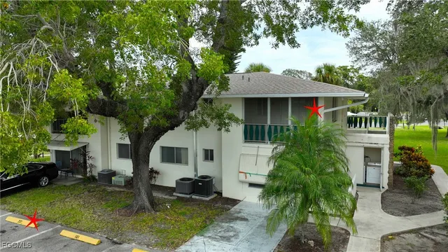 an aerial view of a house with a garden