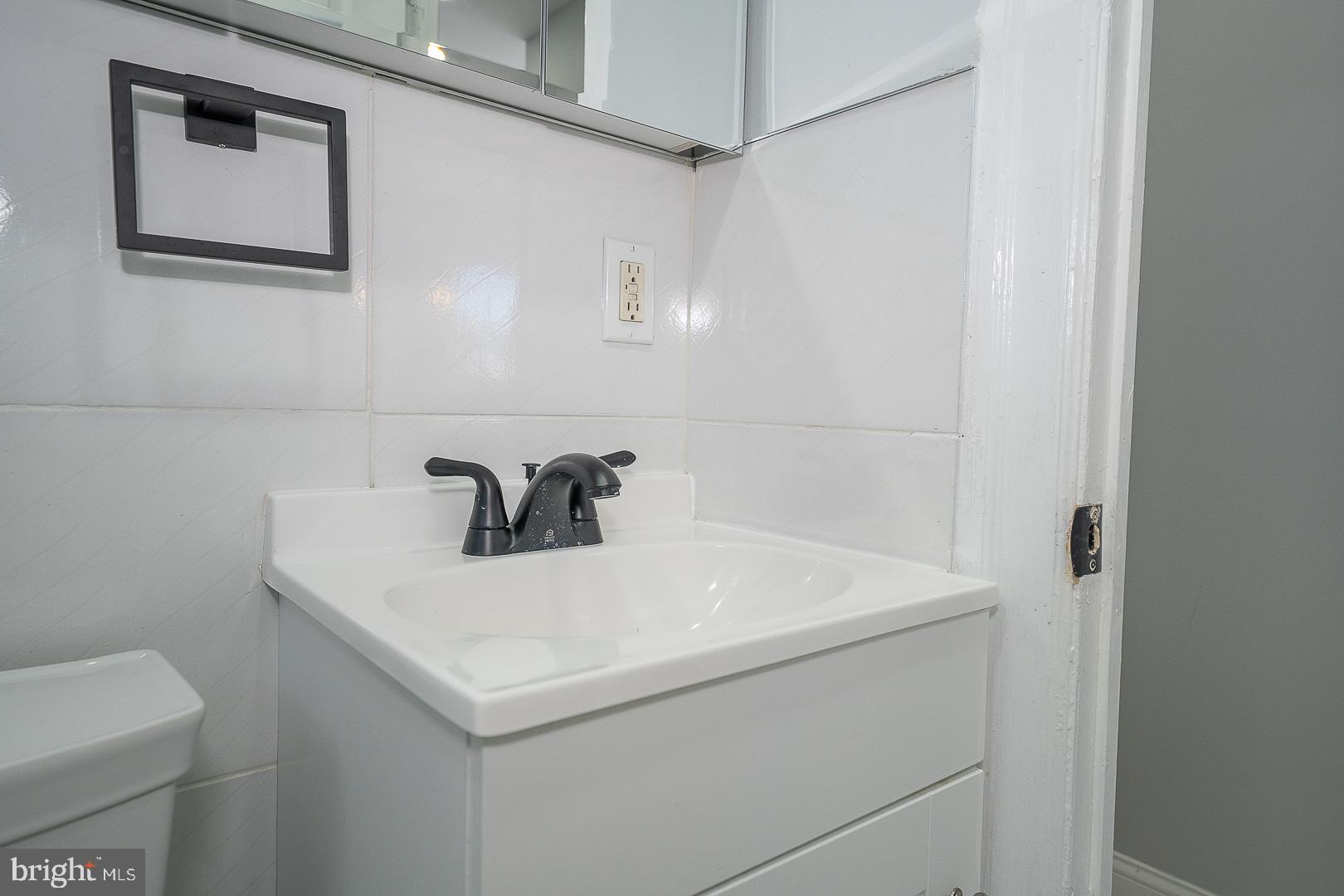 100 Englewood Road Upper Darby, PA 19082 - Photo 17 of 88 a close view of a sink a faucet and appliance in a bathroom