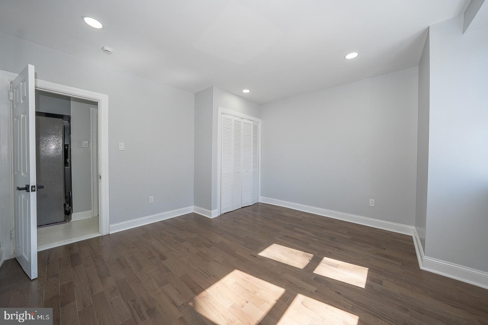 100 Englewood Road Upper Darby, PA 19082 - Photo 19 of 88 wooden floor in an empty room with a window