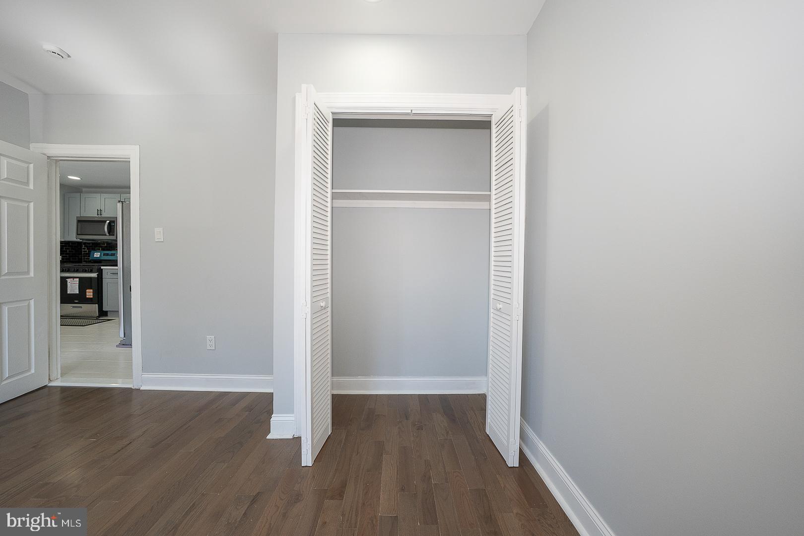 100 Englewood Road Upper Darby, PA 19082 - Photo 20 of 88 an empty room with wooden floor & closet