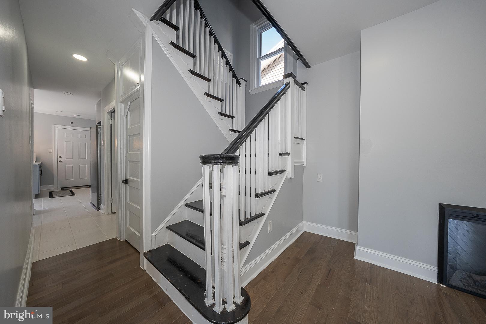 100 Englewood Road Upper Darby, PA 19082 - Photo 33 of 88 a view of entryway with wooden floor and stairs
