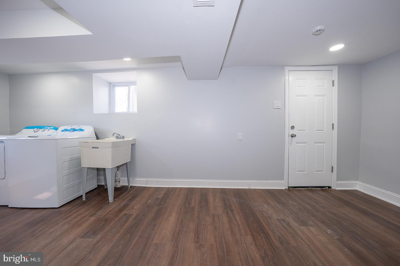 100 Englewood Road Upper Darby, PA 19082 - Photo 53 of 88 a view of a room with wooden floor and utility
