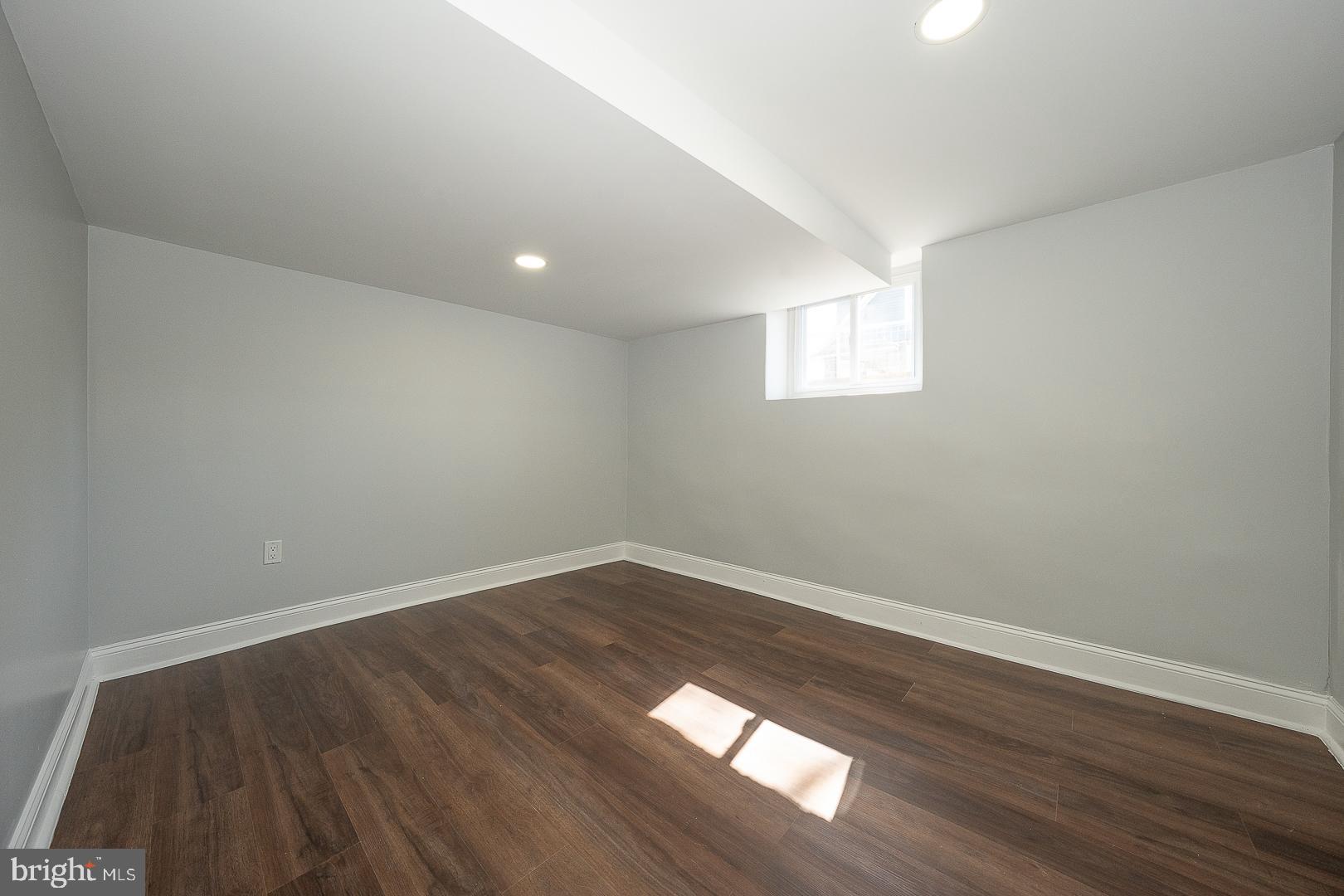 100 Englewood Road Upper Darby, PA 19082 - Photo 57 of 88 a view of an empty room and wooden floor