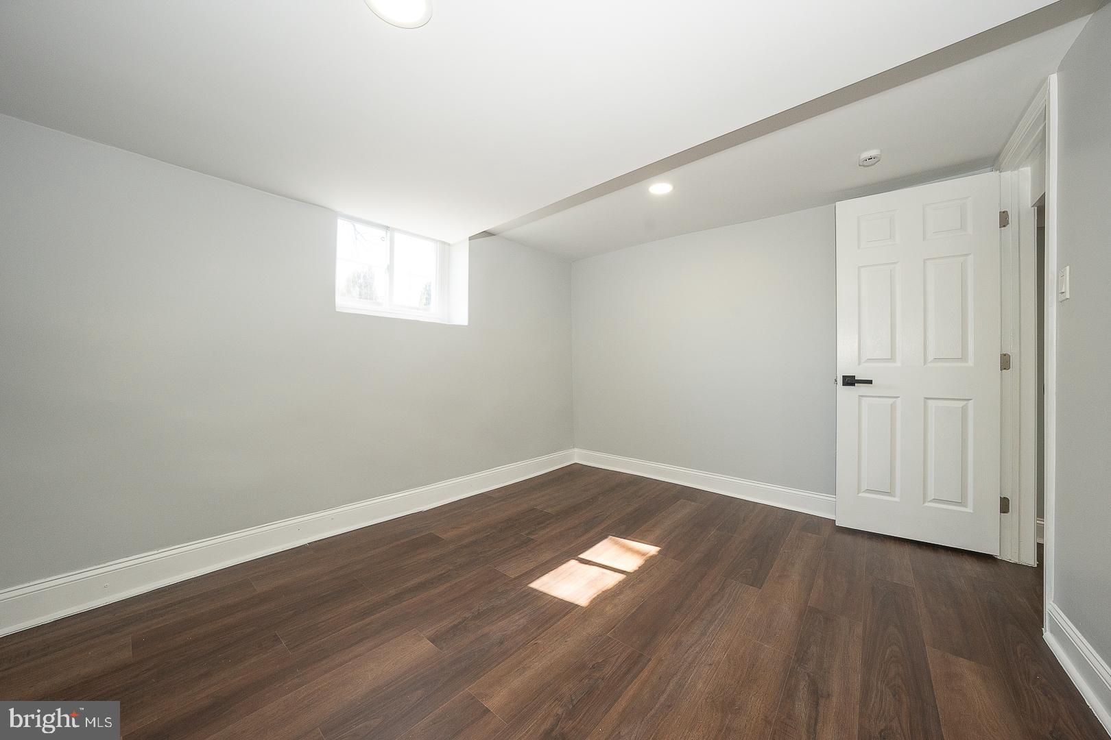 100 Englewood Road Upper Darby, PA 19082 - Photo 58 of 88 a view of a room with wooden floors and led lights