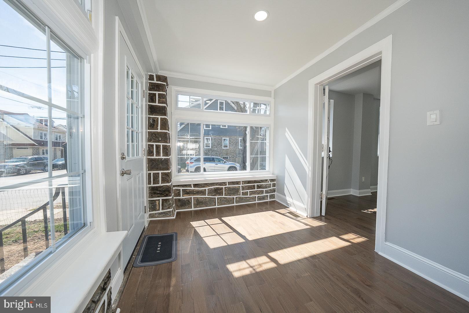 100 Englewood Road Upper Darby, PA 19082 - Photo 9 of 88 a view of a room with wooden floor and windows