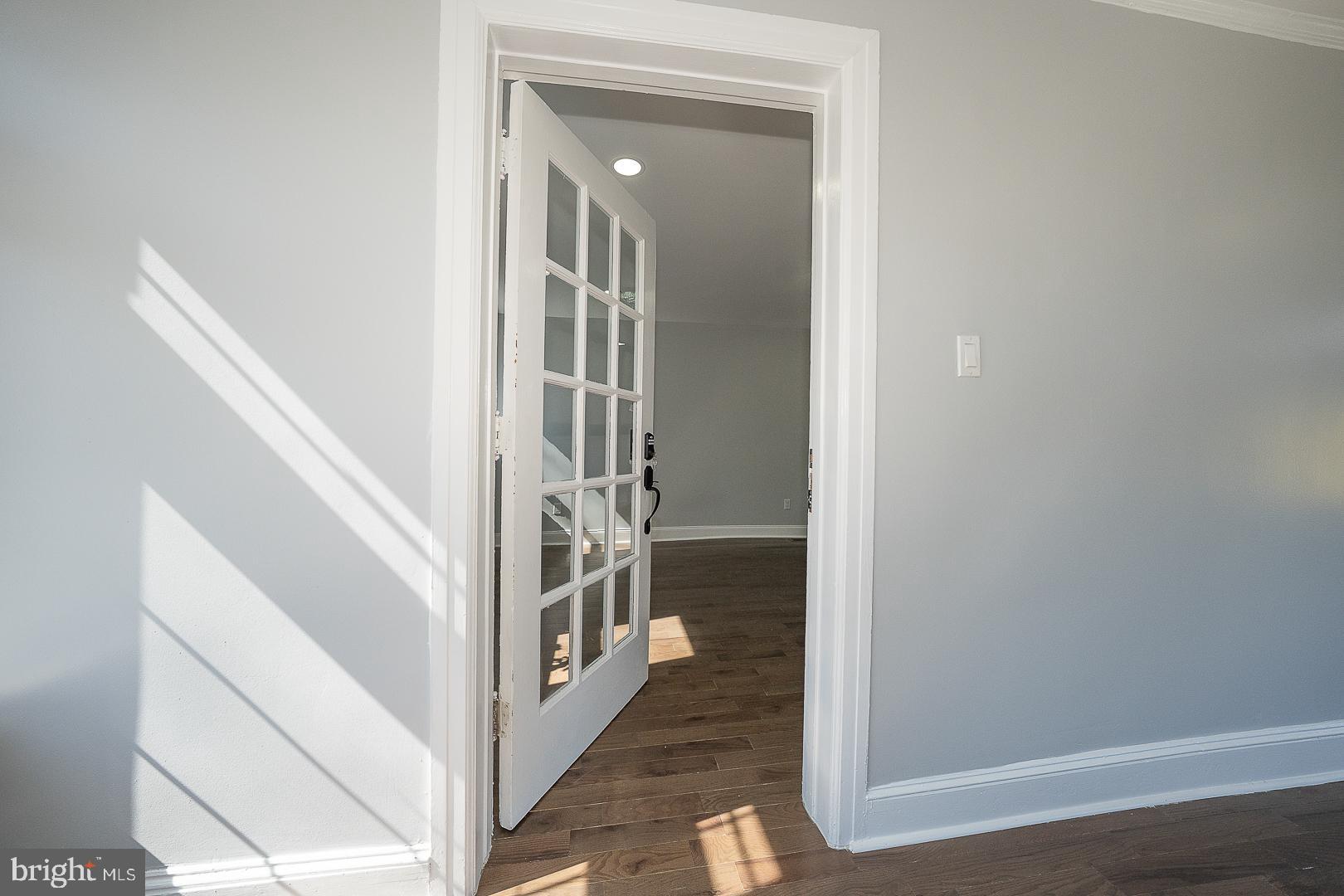 100 Englewood Road Upper Darby, PA 19082 - Photo 10 of 88 a view of a hallway with wooden floor and entryway