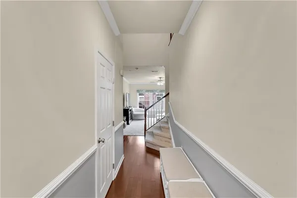 a view of a hallway with stairs