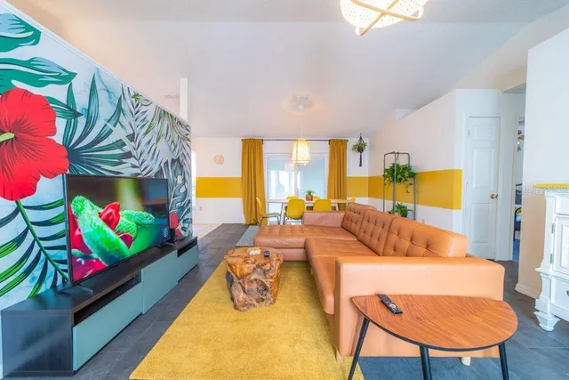 a living room with furniture and a couch