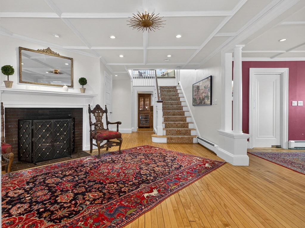 78 Denton Road Wellesley, MA 02482 - Photo 2 of 29 a living room with a fireplace