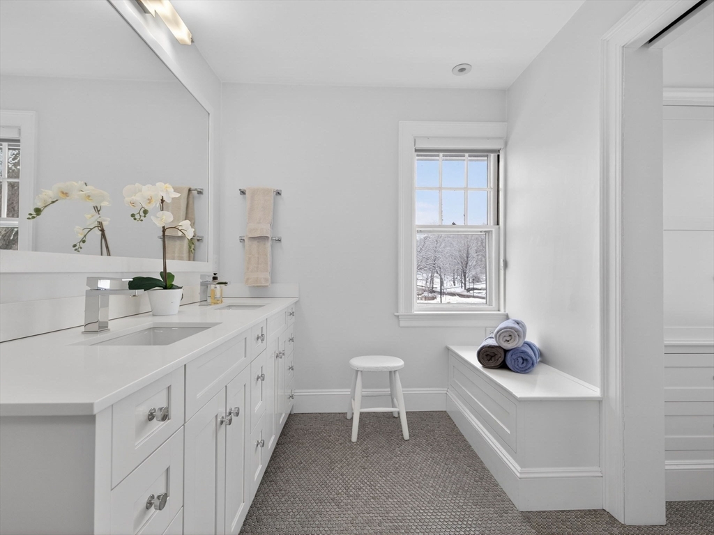 78 Denton Road Wellesley, MA 02482 - Photo 21 of 29 a spacious bathroom with a double vanity sink and a window