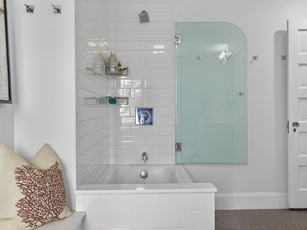 78 Denton Road Wellesley, MA 02482 - Photo 23 of 29 a bathroom with a bathtub and shower