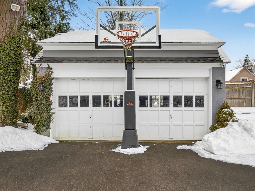 78 Denton Road Wellesley, MA 02482 - Photo 25 of 29 a front view of a building with garage