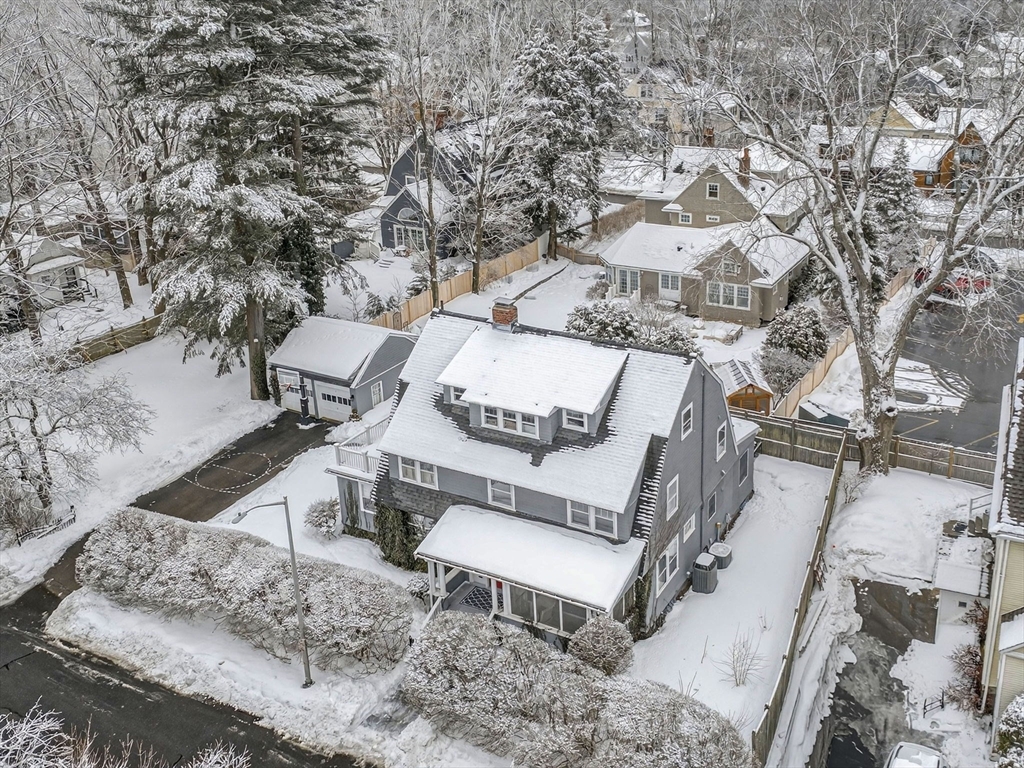 78 Denton Road Wellesley, MA 02482 - Photo 27 of 29 a view of a terrace with chairs and a table