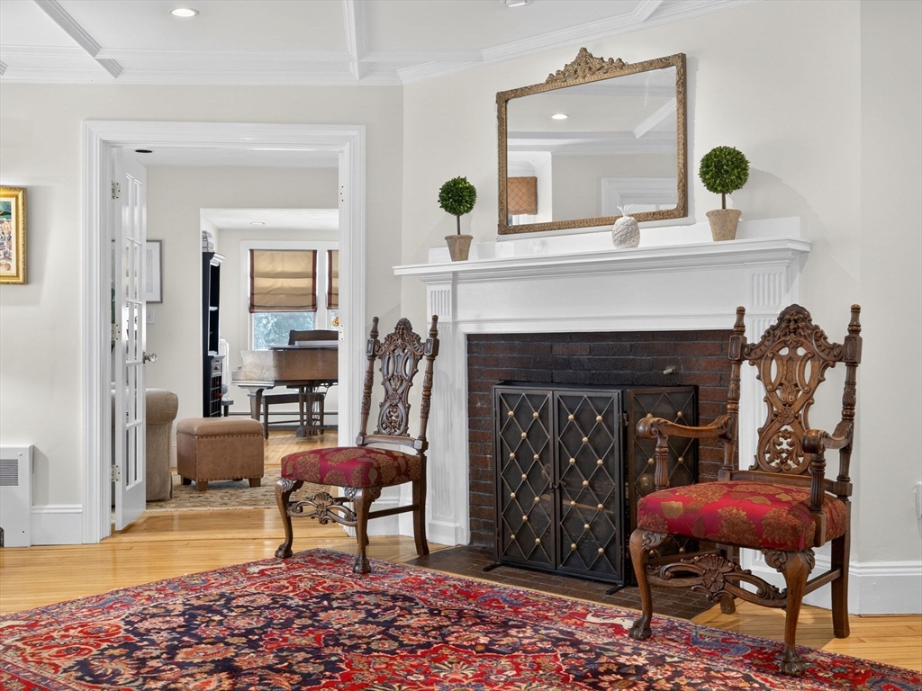 78 Denton Road Wellesley, MA 02482 - Photo 4 of 29 a living room with furniture and a fireplace