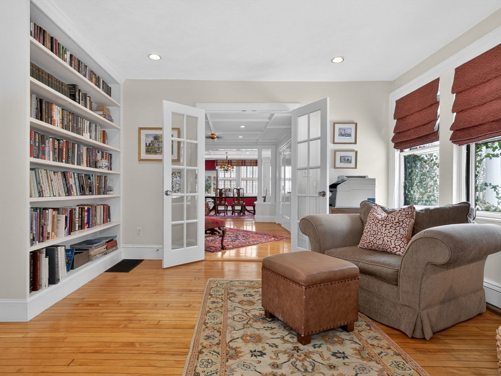 78 Denton Road Wellesley, MA 02482 - Photo 5 of 29 a living room with furniture and a book shelf