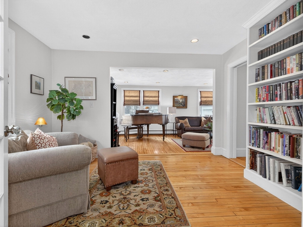 78 Denton Road Wellesley, MA 02482 - Photo 6 of 29 a living room with furniture and a book shelf